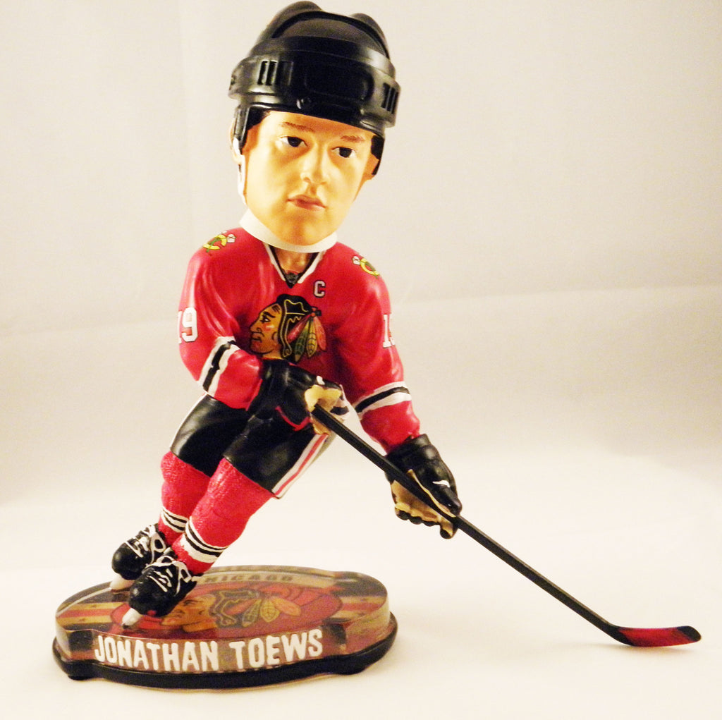 NHL Captain Series Jonathan Toews Chicago Blackhawks Souvenir Hockey Puck  In Cube
